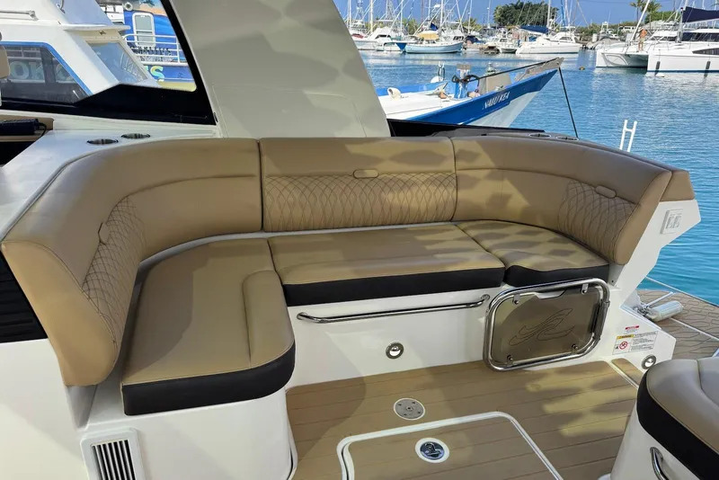 Slide: The Image of Luxurious seating on 2022 Sea Ray Sundancer 370 Outboard, docked at marina. - 28