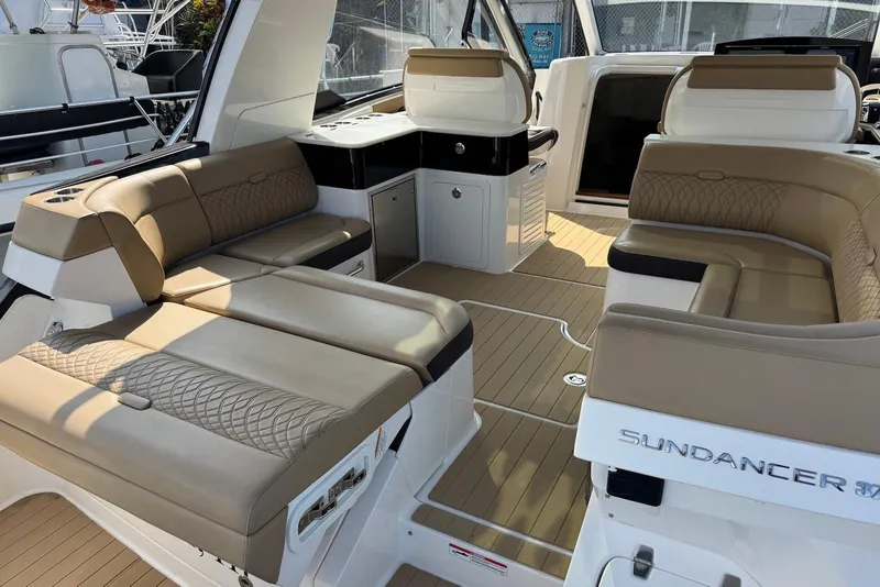 Slide: The Image of 2022 Sea Ray Sundancer 370 Outboard interior with luxurious seating and modern design. - 29
