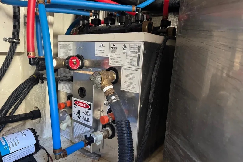 Slide: The Image of Engine room of 2022 Sea Ray Sundancer 370 Outboard with Kuuma water heater. - 32