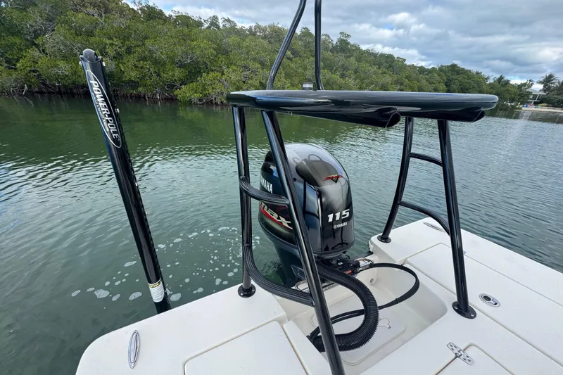 Slide: The Image of 2018 Hewes Redfisher 18 boat with Yamaha 115 engine on calm water. - 12