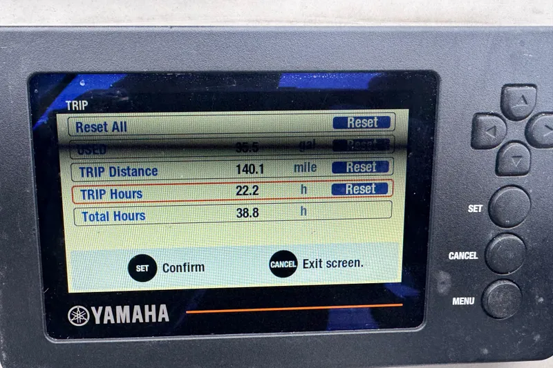 Slide: The Image of Yamaha display showing trip data: 140.1 miles, 22.2 hours on Hewes Redfisher 18, 2018. - 4