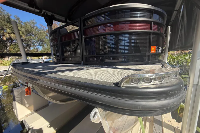 Slide: The Image of 2024 Bennington L Line pontoon boat with sleek design and modern features. - 3