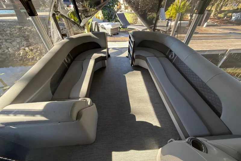 Slide: The Image of 2024 Bennington L Line interior with luxurious seating and elegant design. - 39