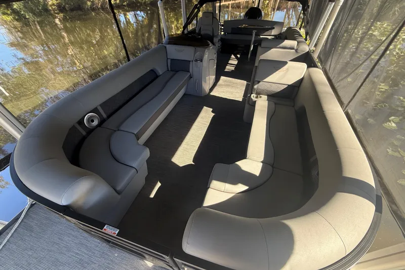 Slide: The Image of 2024 Bennington L Line pontoon boat interior with spacious seating and modern design. - 6