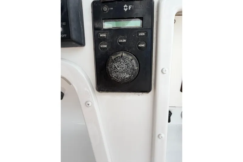 Slide: The Image of Control panel on a 1985 Bertram 54 Convertible boat. - 18