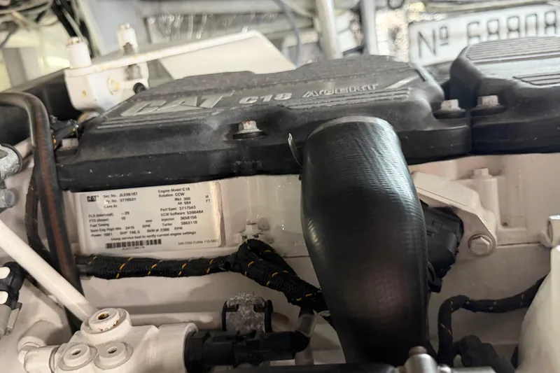 Slide: The Image of Engine compartment of a 1985 Bertram 54 Convertible with CAT C18 engine. - 23