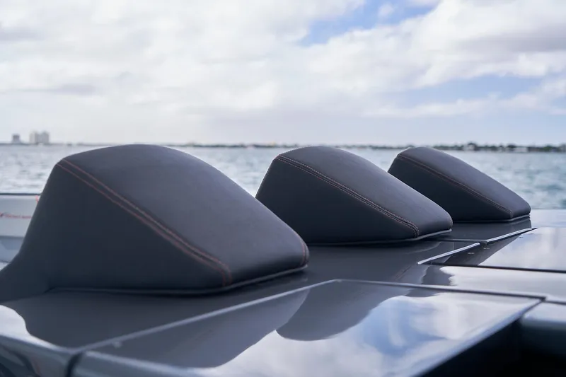 Slide: The Image of 2020 Midnight Express 43 Open boat seats with ocean backdrop. - 102