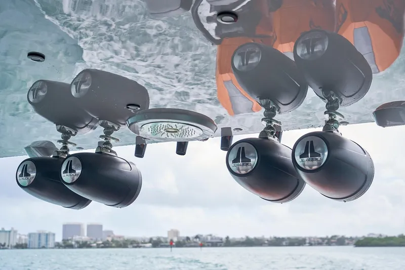 Slide: The Image of Underwater speakers on a 2020 Midnight Express 43 Open boat, featuring JL Audio branding. - 115