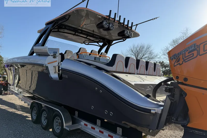 Slide: The Image of 2020 Midnight Express 43 Open boat on trailer with powerful Racing 450 engine. - 20