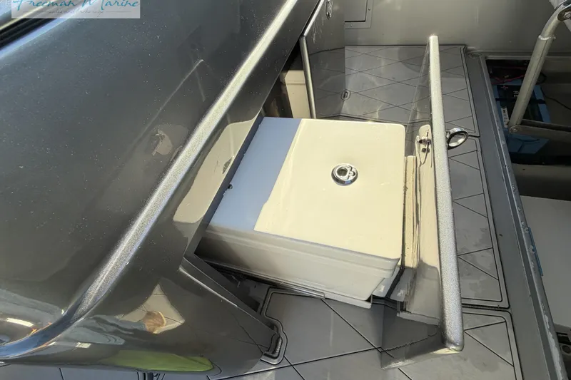 Slide: The Image of Storage compartment on a 2020 Midnight Express 43 Open boat, featuring sleek design and functionality. - 39
