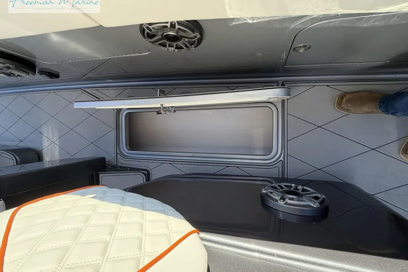 Slide: The Image of 2020 Midnight Express 43 Open interior with quilted seating and modern speaker system. - 41