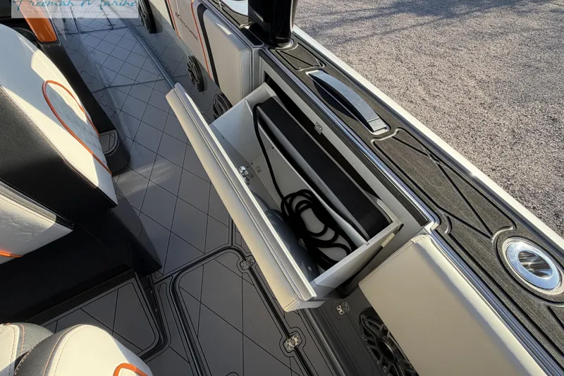 Slide: The Image of 2020 Midnight Express 43 Open boat interior with open storage compartment. - 45
