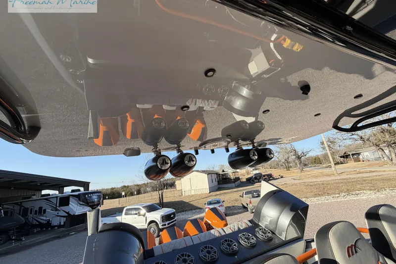 Slide: The Image of 2020 Midnight Express 43 Open boat with advanced audio system and sleek design. - 47