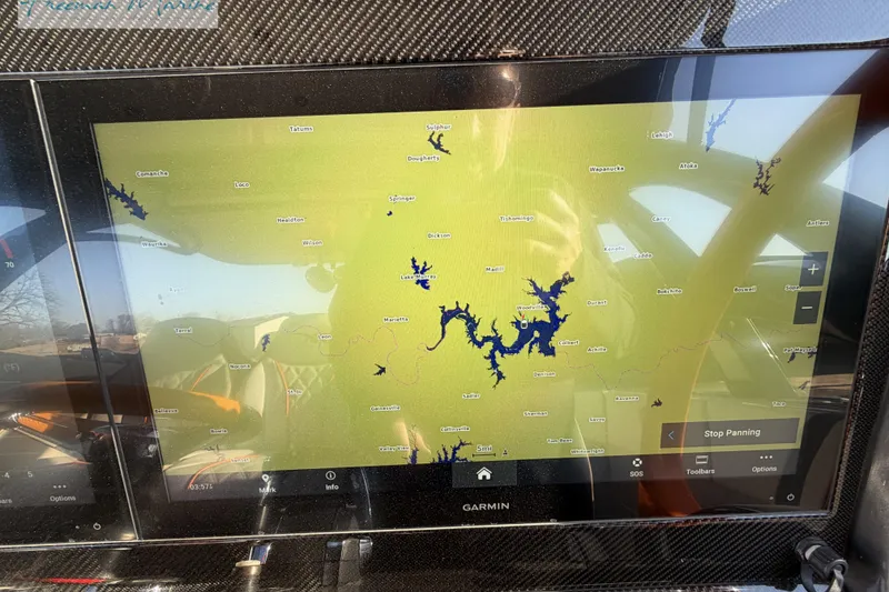 Slide: The Image of Garmin navigation screen on 2020 Midnight Express 43 Open boat, displaying detailed map view. - 52