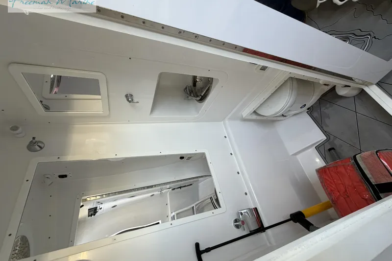 Slide: The Image of 2020 Midnight Express 43 Open boat interior with modern amenities and sleek design. - 60