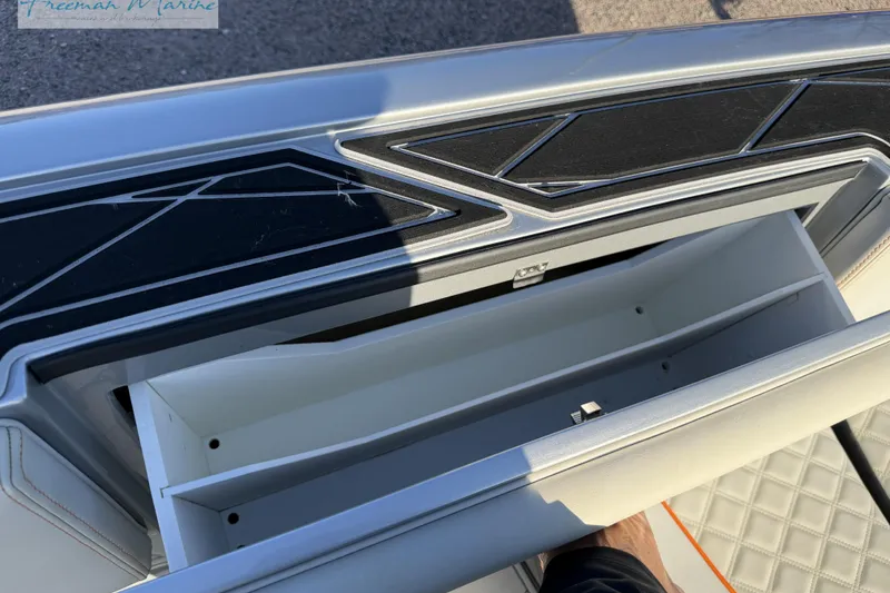 Slide: The Image of Open storage compartment on 2020 Midnight Express 43 Open boat, featuring sleek design details. - 63