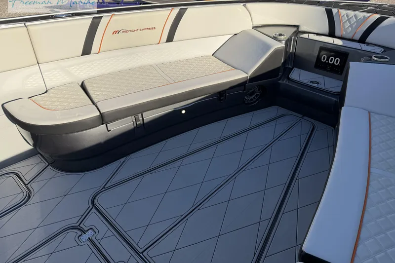 Slide: The Image of Luxurious interior of 2020 Midnight Express 43 Open boat with cushioned seating. - 65