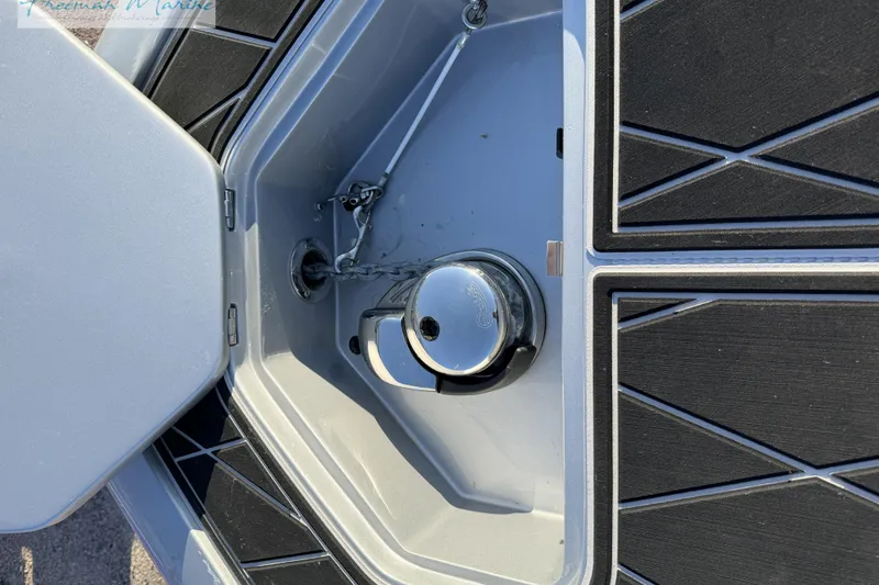 Slide: The Image of Open storage compartment on 2020 Midnight Express 43 Open boat, featuring sleek design and hardware. - 73