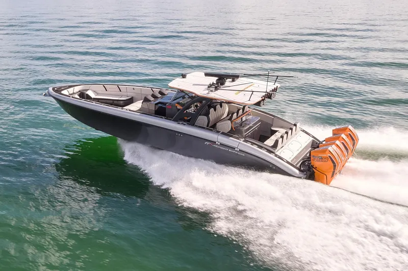Slide: The Image of 2020 Midnight Express 43 Open boat cruising on water with powerful engines. - 85