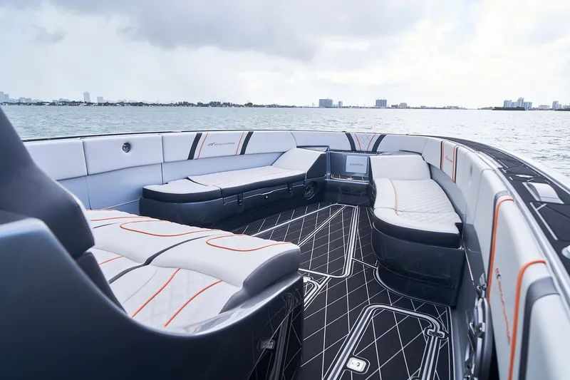 Slide: The Image of Luxurious 2020 Midnight Express 43 Open boat interior with stylish seating and scenic water view. - 96