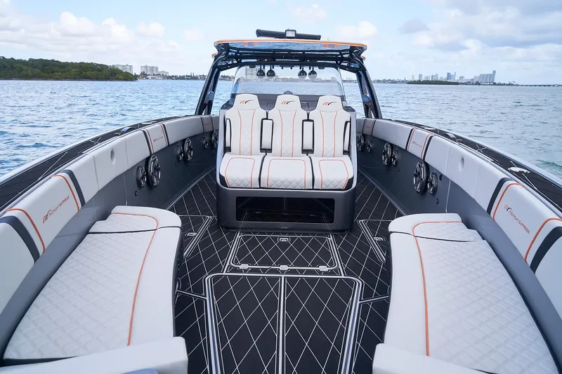 Slide: The Image of 2020 Midnight Express 43 Open boat interior with luxurious seating and ocean view. - 97
