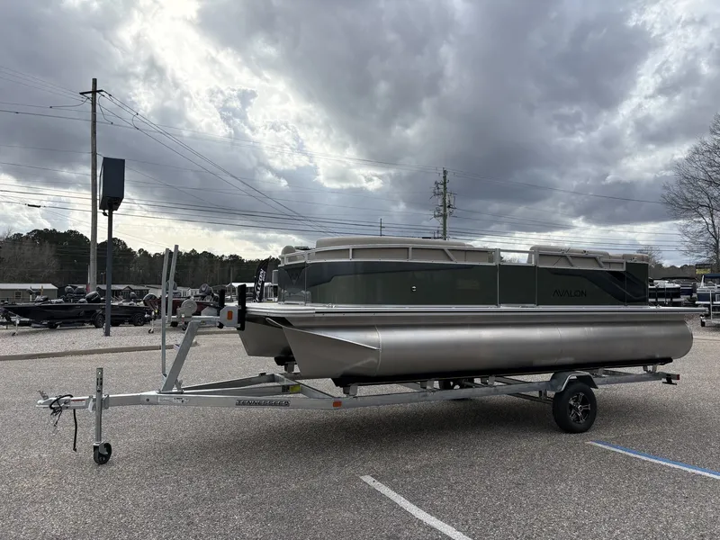 Slide: The Image of Avalon Venture 85 Cruise 2026 on trailer under cloudy sky. - 4