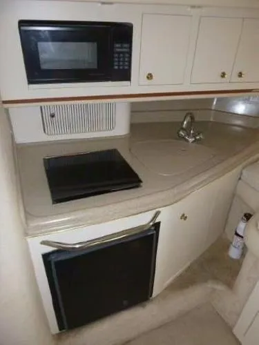 Slide: The Image of Sea Ray Amberjack 290 2000 - 9