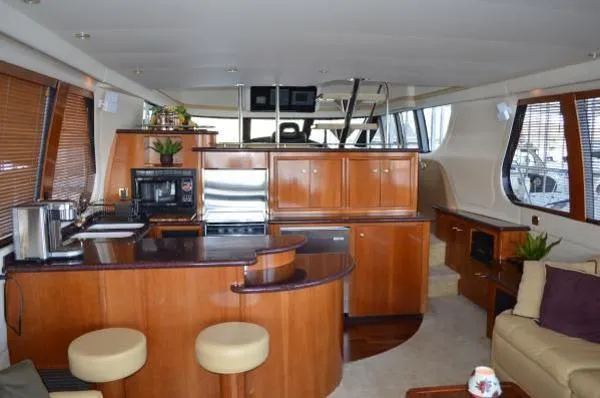 Slide: The Image of Carver Yachts 570 Voyager LLC owned 2001 - 4