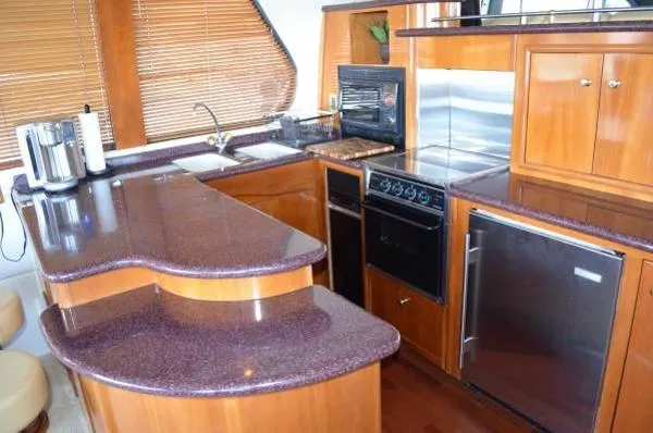 Slide: The Image of Carver Yachts 570 Voyager LLC owned 2001 - 6