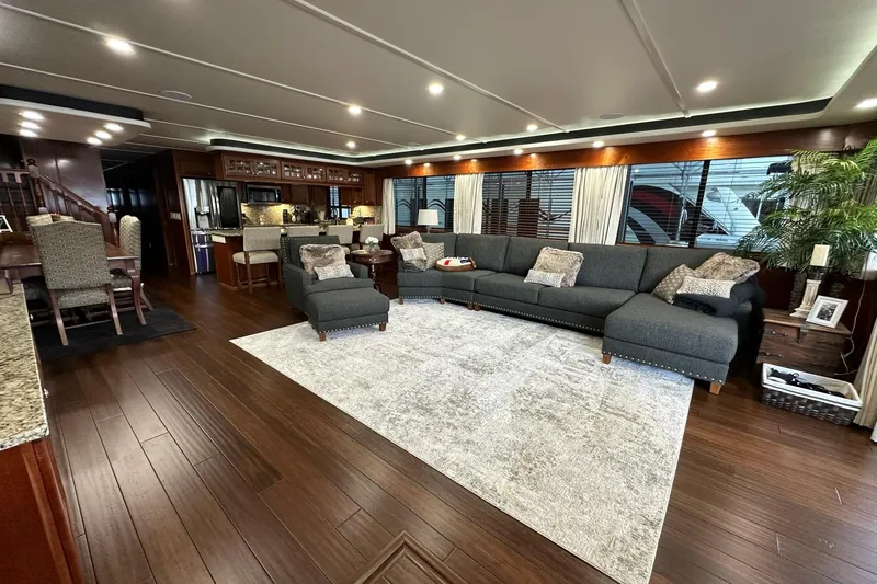Slide: The Image of Luxurious interior of a 2022 Trifecta houseboat with modern furnishings. - 15