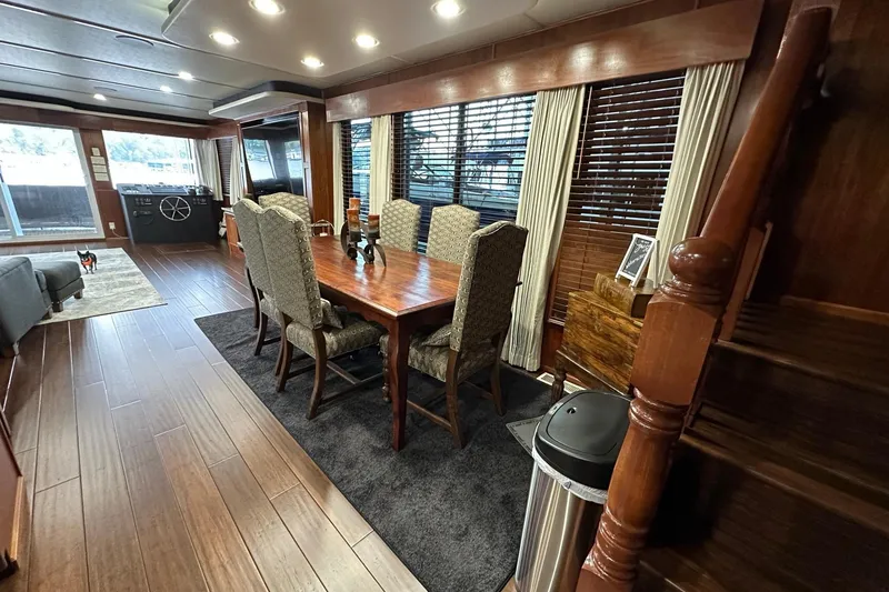 Slide: The Image of Luxurious 2022 Trifecta houseboat interior with elegant dining area and modern decor. - 17