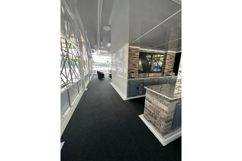 Slide: The Image of Luxurious 2022 Trifecta houseboat interior with modern design and spacious layout. - 54