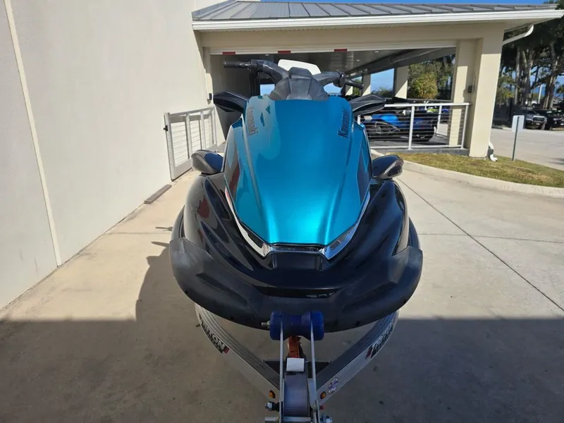 Slide: The Image of 2022 Kawasaki STX®160LX jet ski in blue, front view. - 3