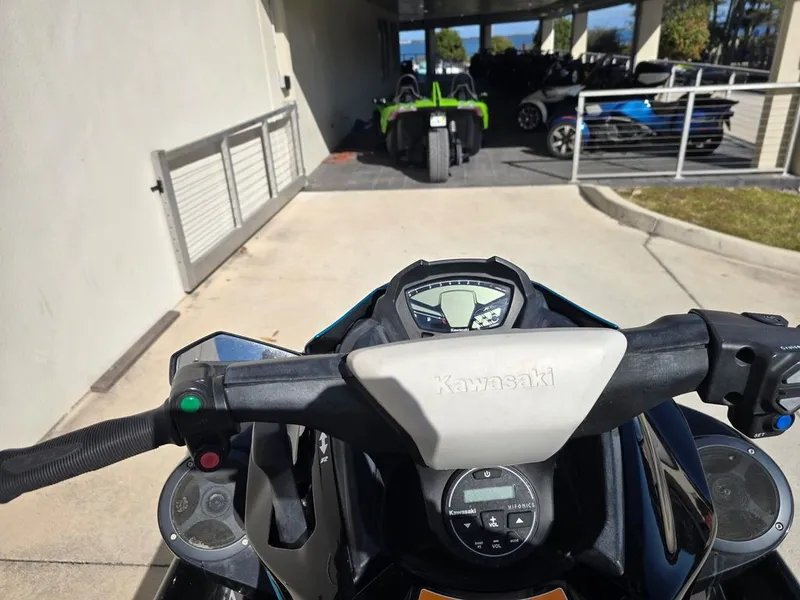 Slide: The Image of Kawasaki STX®160LX 2022 dashboard and handlebar view. - 9