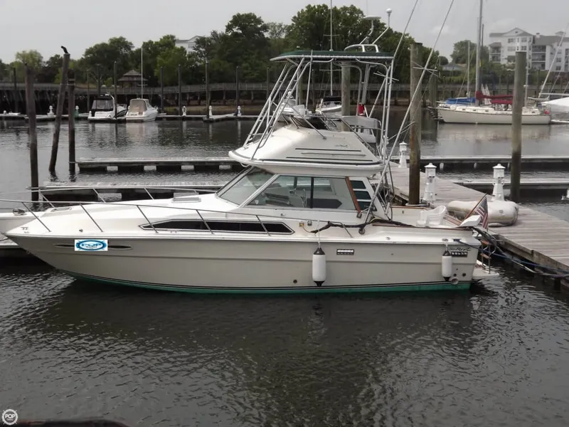 Slide: The Image of Sea Ray 310 Sport Bridge 1983 - 1