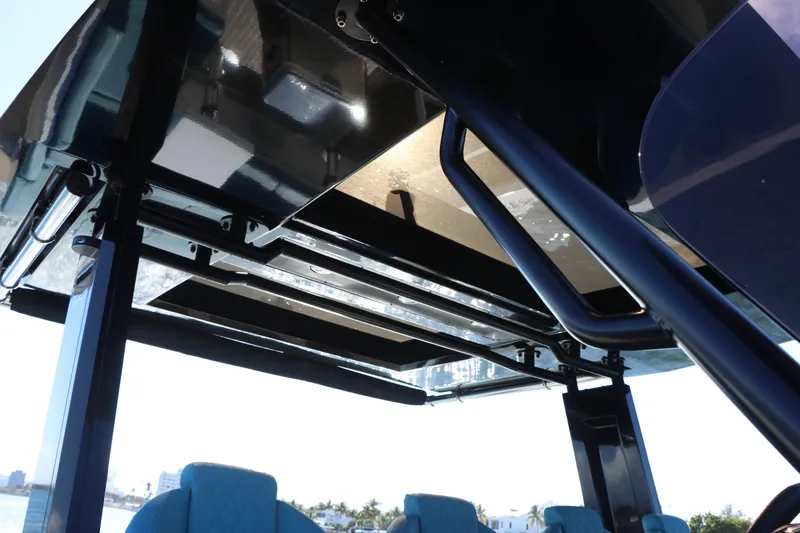 Slide: The Image of 2022 De Antonio Yachts 42, sleek interior roof design with modern blue seating. - 26