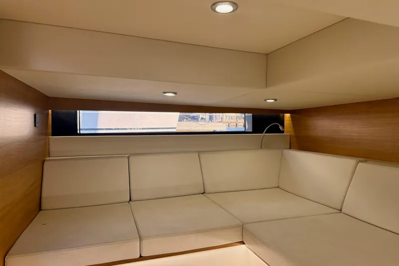 Slide: The Image of Luxurious interior of 2022 De Antonio Yachts 42 with modern seating and ambient lighting. - 71