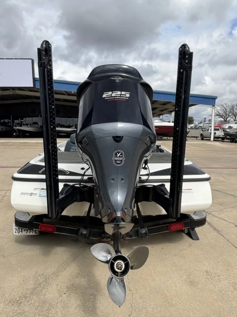 Slide: The Image of Rear view of a 2016 Skeeter ZX225 boat with outboard motor. - 10