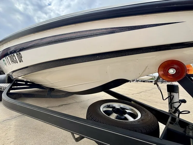 Slide: The Image of 2016 Skeeter ZX225 boat on trailer, close-up view. - 4