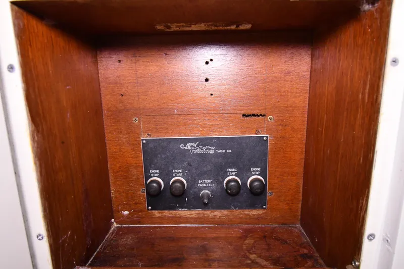 Slide: The Image of Control panel of a 1988 Viking 48 Convertible yacht with wooden enclosure. - 12