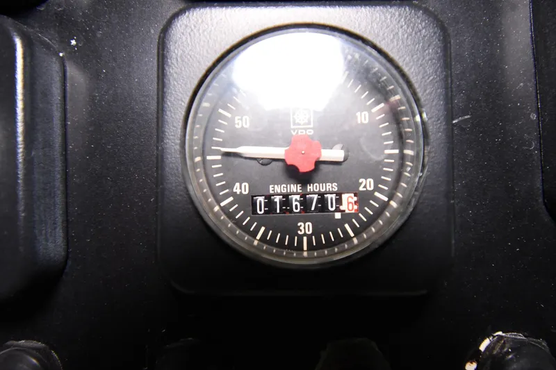 Slide: The Image of Engine hour meter on 1988 Viking 48 Convertible, displaying 1670.6 hours. - 27