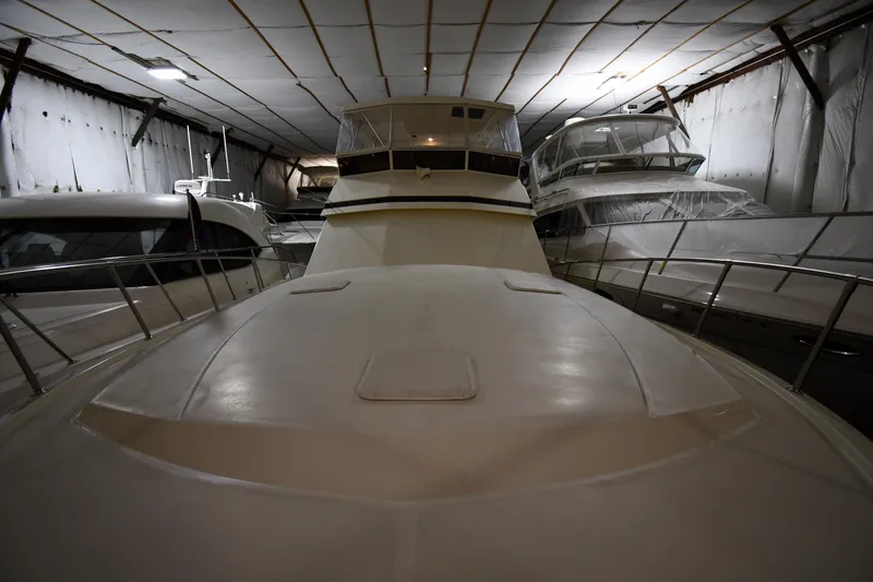Slide: The Image of 1988 Viking 48 Convertible Yacht in storage facility. - 6