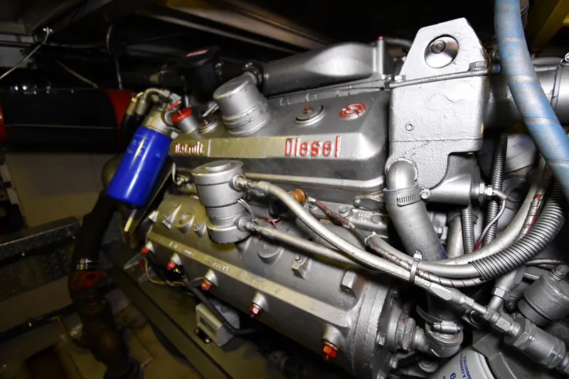 Slide: The Image of 1988 Viking 48 Convertible diesel engine, detailed view with visible components and wiring. - 82