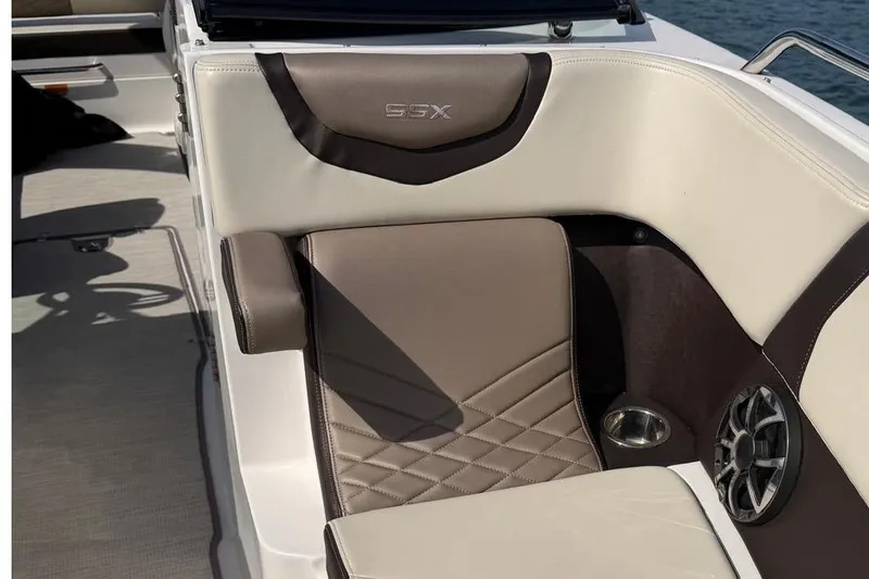 Slide: The Image of Interior of 2018 Chaparral 267 SSX with luxurious upholstery. - 19