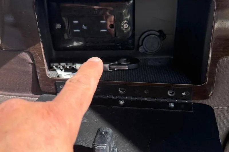 Slide: The Image of Finger pointing at dashboard in Chaparral 267 SSX boat. - 22
