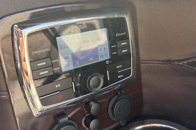 Slide: The Image of Polk audio system in 2018 Chaparral 267 SSX boat, featuring Bluetooth connectivity. - 7