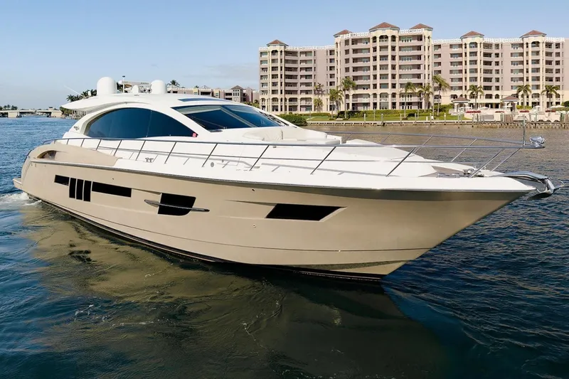 The Image of Luxury 2013 Lazzara 64 yacht cruising near waterfront buildings. - 0