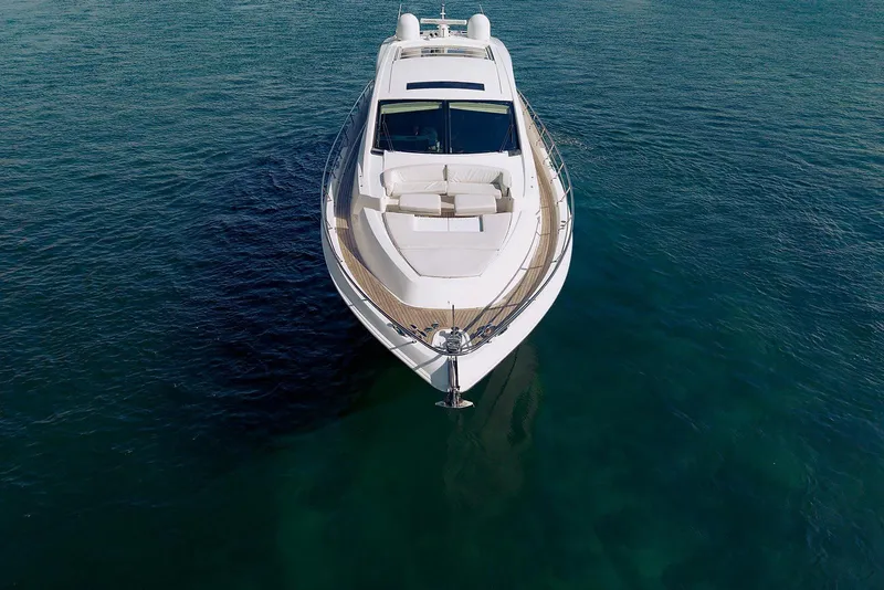 Slide: The Image of 2013 Lazzara 64 yacht on calm blue water, aerial view. - 4