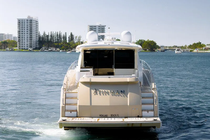 Slide: The Image of Luxury 2013 Lazzara 64 yacht cruising on a scenic waterway. - 8