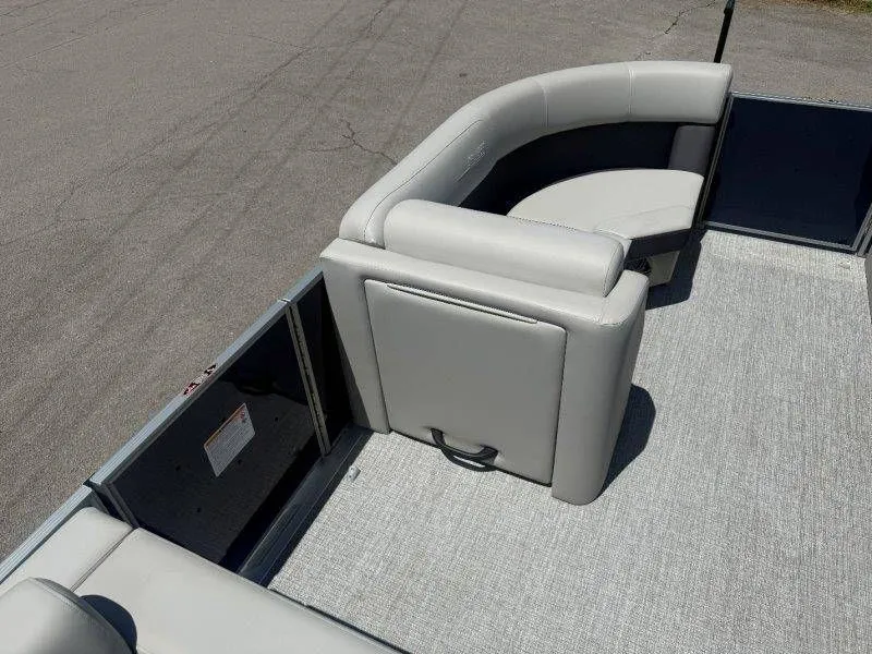 Slide: The Image of Interior of 2025 Harris Cruiser 210 FC with gray seating. - 21